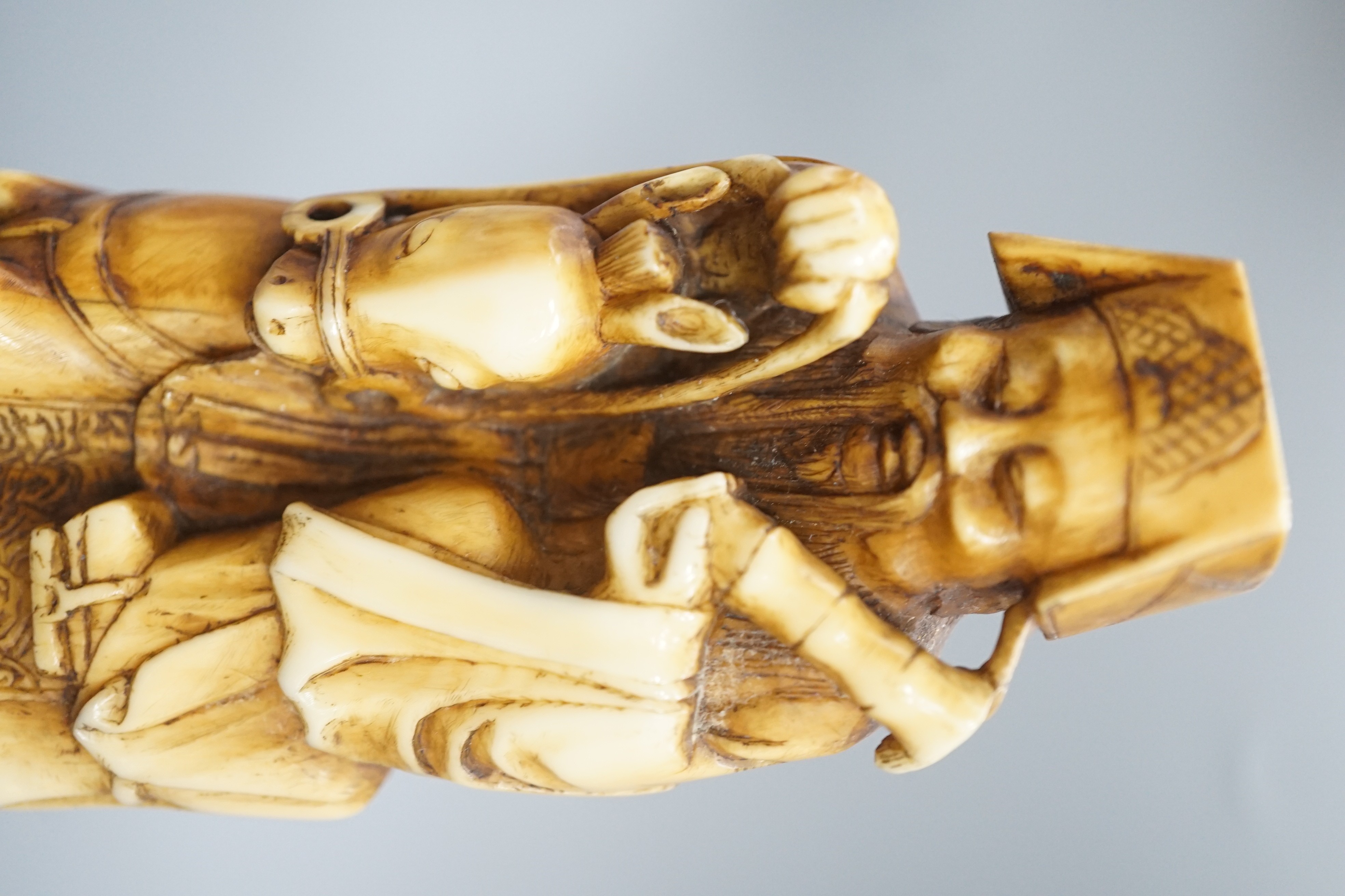 A Chinese hippopotamus ivory group of Zhang Guolao riding a horse, 19th century 14cm
